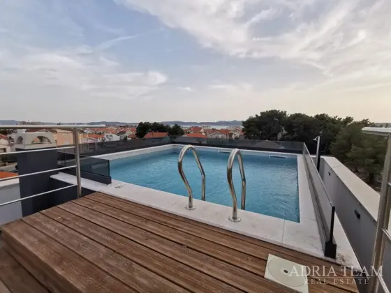 ŠTVORIZBOVÝ BYT SO STREŠNOU TERASOU A BAZÉNOM, NOVOSTAVBA - BELAFUŽA, ZADAR nehnuteľnosť na predaj
